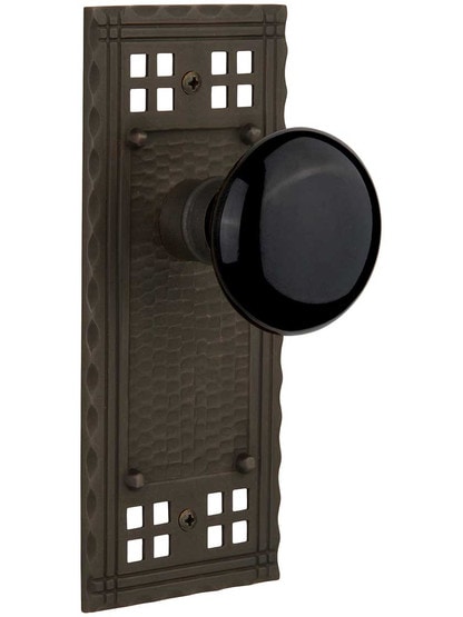 Pasadena Door Set with Black Porcelain Knobs in Oil-Rubbed Bronze.